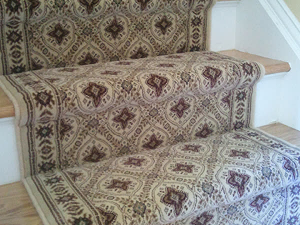 Decorative stair runner installation