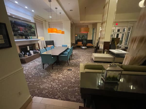 Patterned carpet installation in a hotel lobby seating area