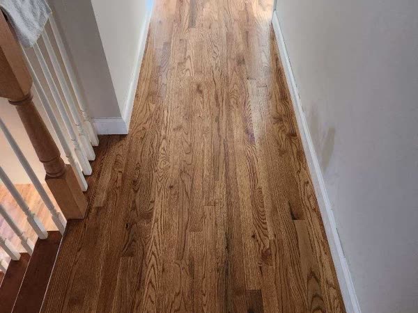 Hardwood staircase after restoration